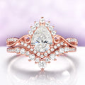 Faye Vintage Pear Shaped Moissanite Engagement Ring Set in Solid 14K Rose Gold